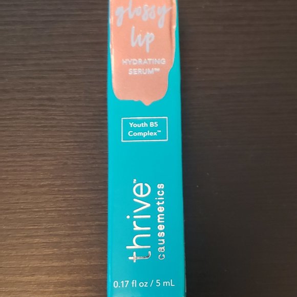 THRIVE CAUSEMETICS Glossy Lip Hydrating Serum $25 - Picture 3 of 11